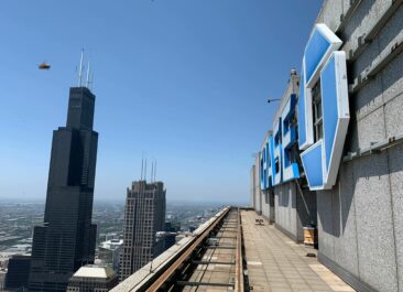 View from the top of the Chase tower in Chicago featuring a rooftop Best Bees beehive
