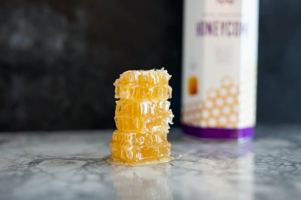 A small piece of honeycomb on a kitchen counter